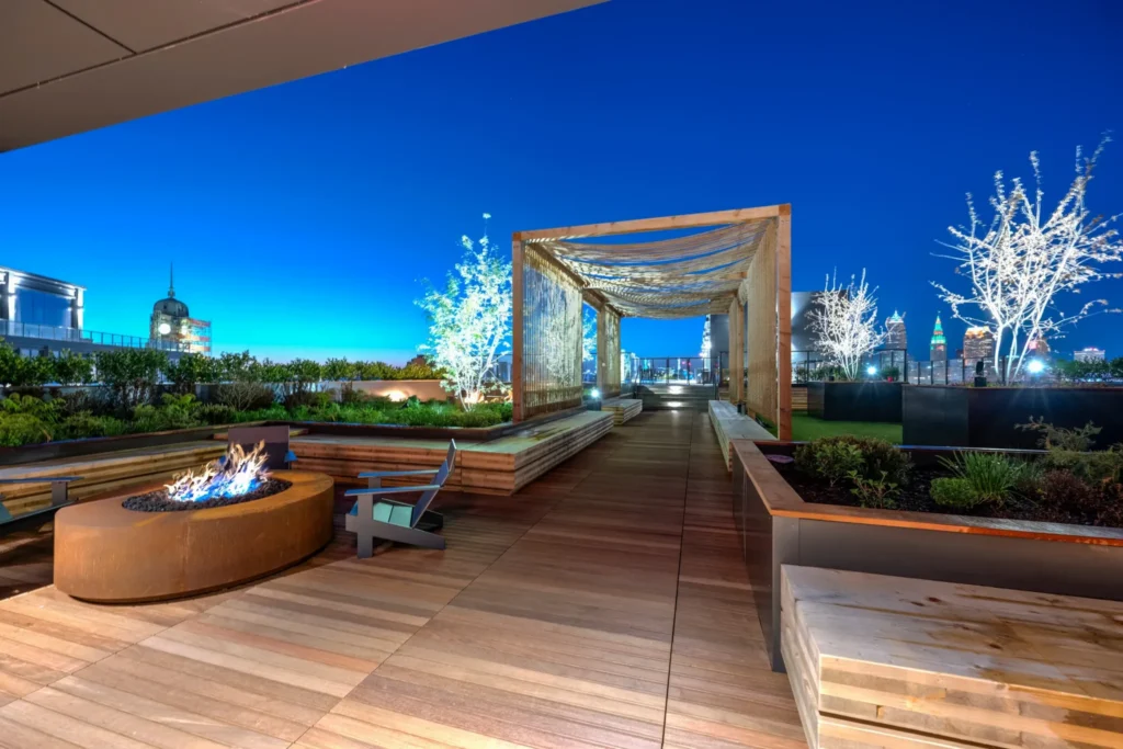 INTRO's rooftop fire lounge at dusk