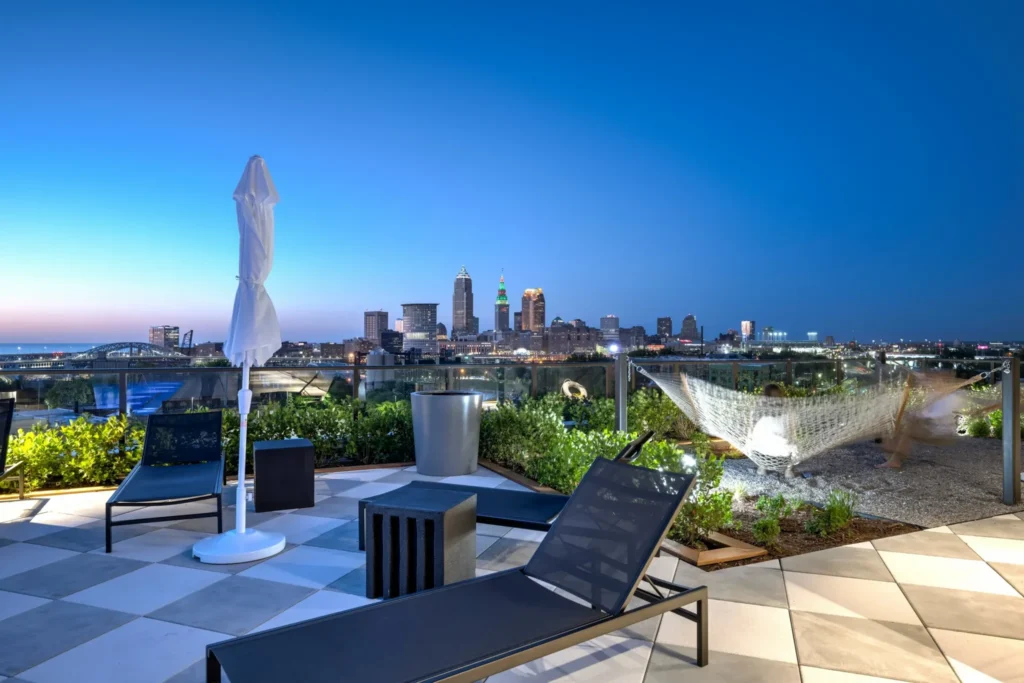 The pool deck with umbrellas and skyline